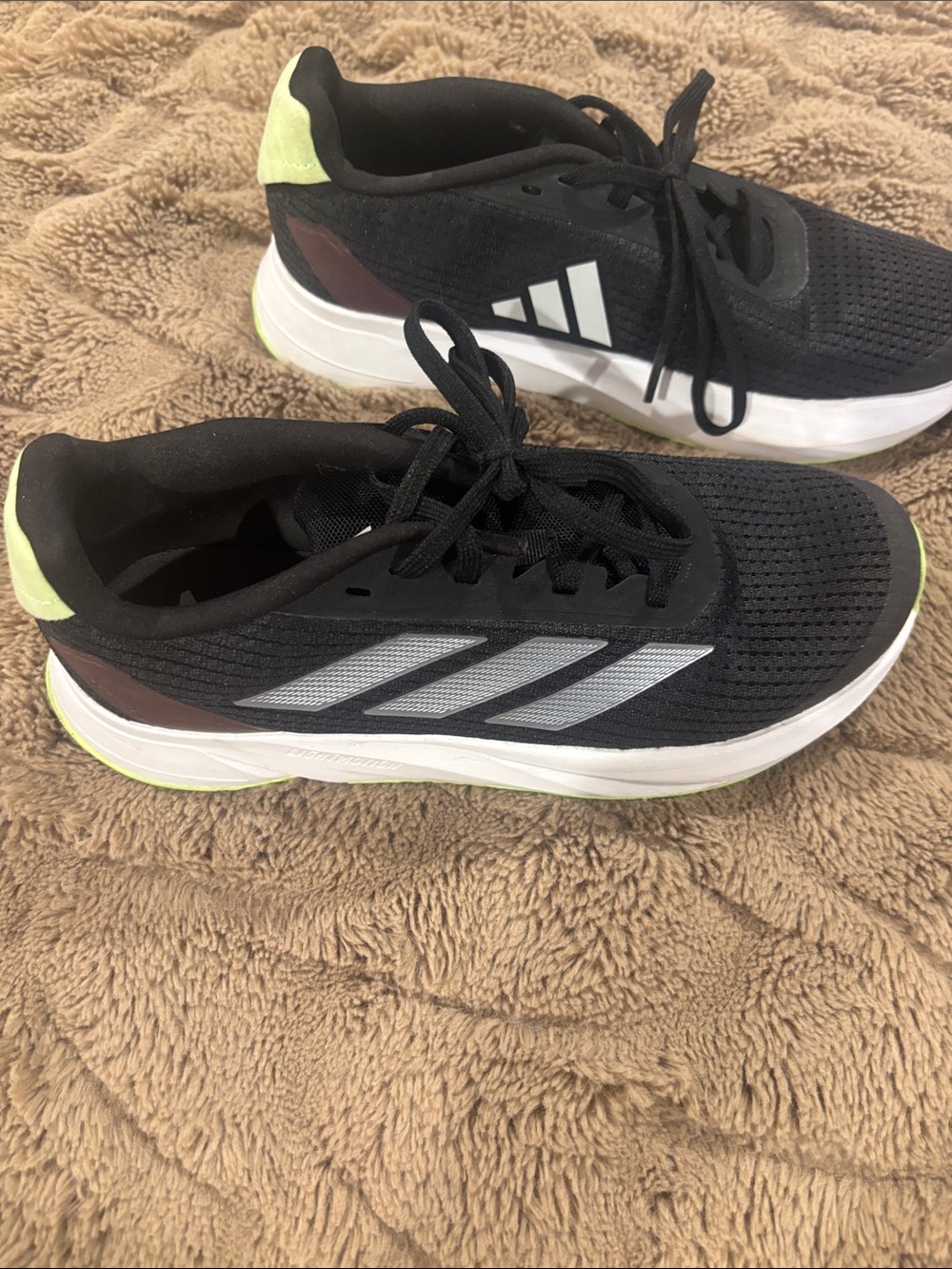 adidas Black Athletic Running Shoes with White Stripes and Neon Yellow Accents